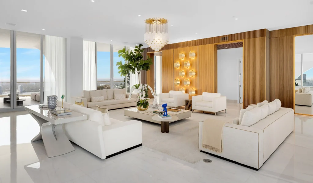Billionaire Adam Weitsman sells his \$28.6m Miami penthouse featuring 12,000 sq ft of luxury living, a private spa, pools, sauna, and sweeping ocean and skyline views.
