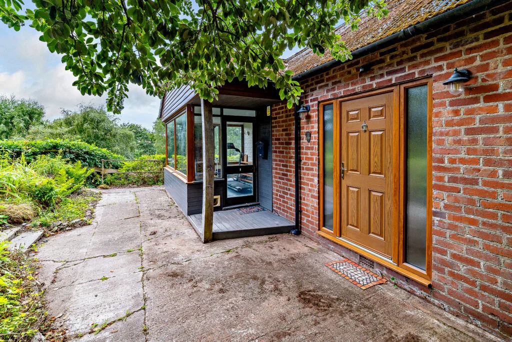 A £520k hidden woodland home in Shropshire offers total privacy, rare plants, historic mine features and nearly an acre of gardens with stunning countryside views.