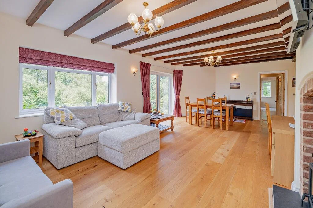 A £520k hidden woodland home in Shropshire offers total privacy, rare plants, historic mine features and nearly an acre of gardens with stunning countryside views.