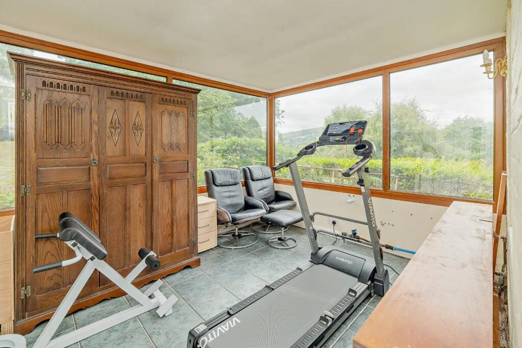 A £520k hidden woodland home in Shropshire offers total privacy, rare plants, historic mine features and nearly an acre of gardens with stunning countryside views.