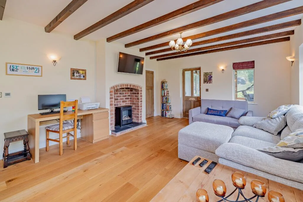 A £520k hidden woodland home in Shropshire offers total privacy, rare plants, historic mine features and nearly an acre of gardens with stunning countryside views.