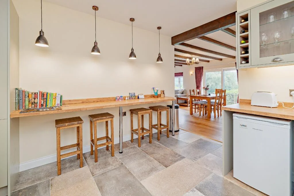 A £520k hidden woodland home in Shropshire offers total privacy, rare plants, historic mine features and nearly an acre of gardens with stunning countryside views.