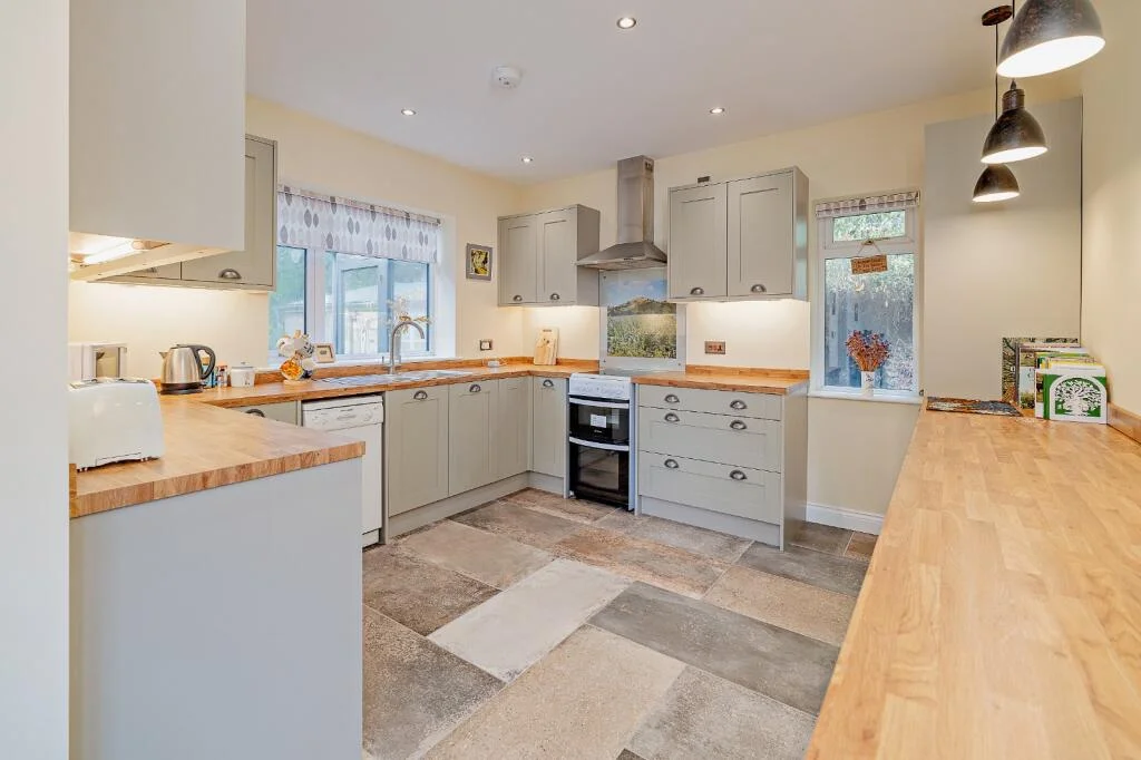 A £520k hidden woodland home in Shropshire offers total privacy, rare plants, historic mine features and nearly an acre of gardens with stunning countryside views.