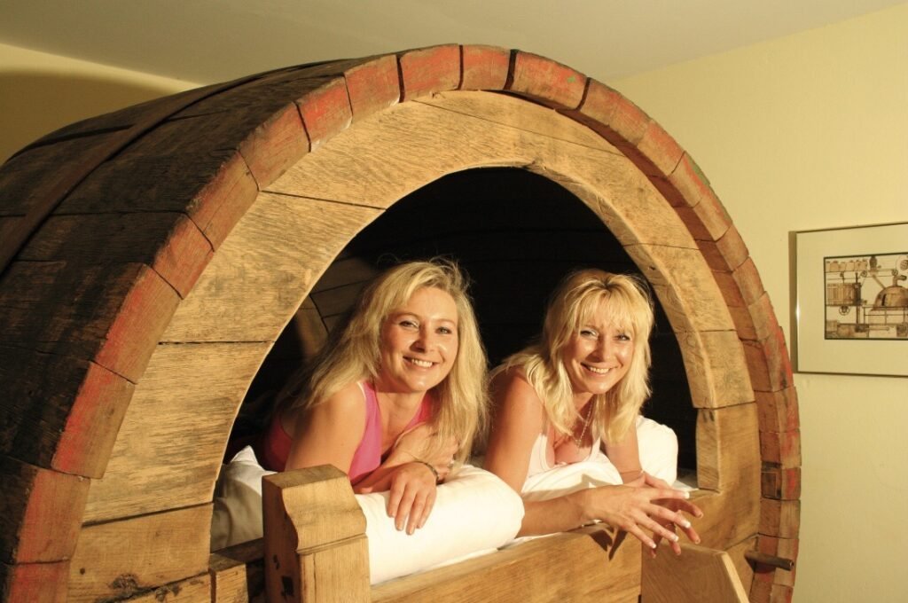 Beverland Resort in Germany lets guests sleep inside real 19th-century beer barrels, complete with cosy beds, modern comforts and beer-themed décor from just £103 a night.