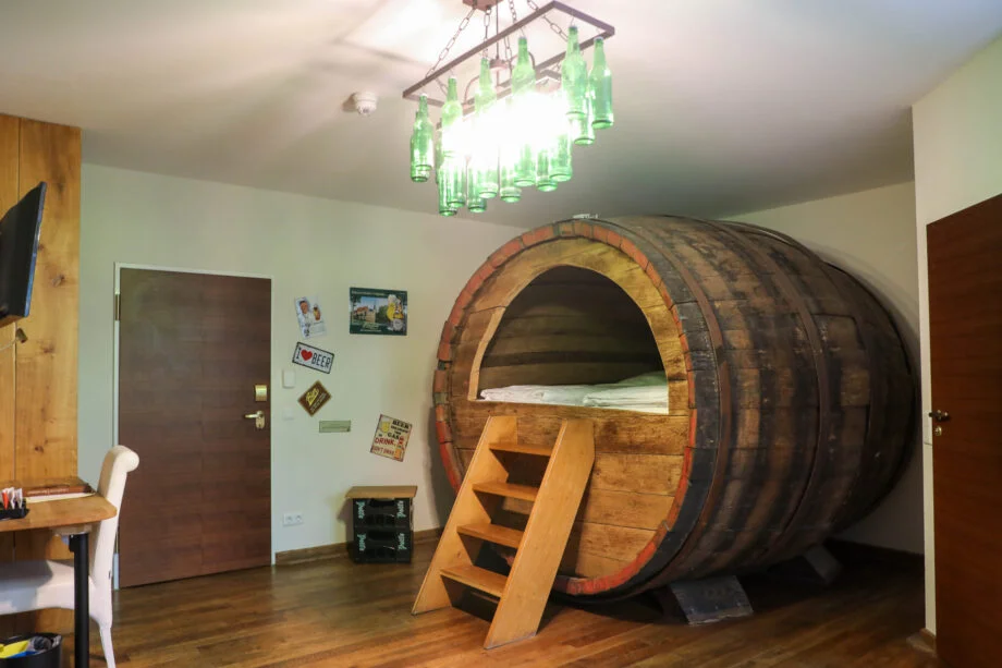 Beverland Resort in Germany lets guests sleep inside real 19th-century beer barrels, complete with cosy beds, modern comforts and beer-themed décor from just £103 a night.