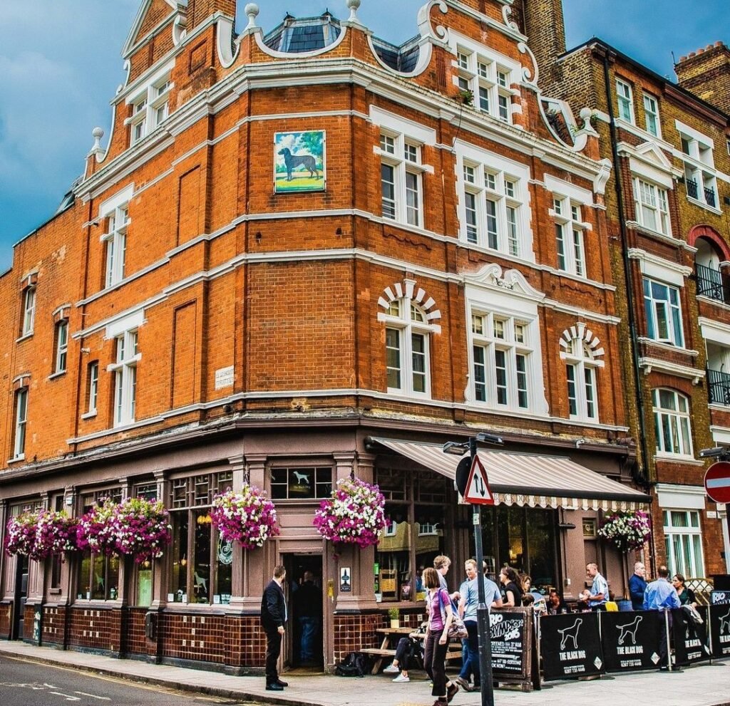 The Black Dog pub in London is celebrating Taylor Swift’s engagement to Travis Kelce with free bubbly and beers for Swifties who buy merch or sing her song The Black Dog.