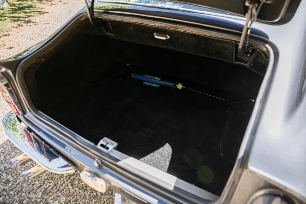 A rare 1966 Aston Martin DB6 Mk1 Vantage with a prized manual gearbox and fewer than 5,000 miles since 1991 has sold at Silverstone auction for £216,000.