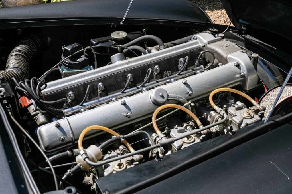 A rare 1966 Aston Martin DB6 Mk1 Vantage with a prized manual gearbox and fewer than 5,000 miles since 1991 has sold at Silverstone auction for £216,000.