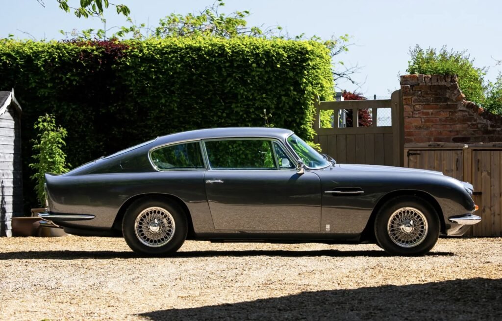 A rare 1966 Aston Martin DB6 Mk1 Vantage with a prized manual gearbox and fewer than 5,000 miles since 1991 has sold at Silverstone auction for £216,000.