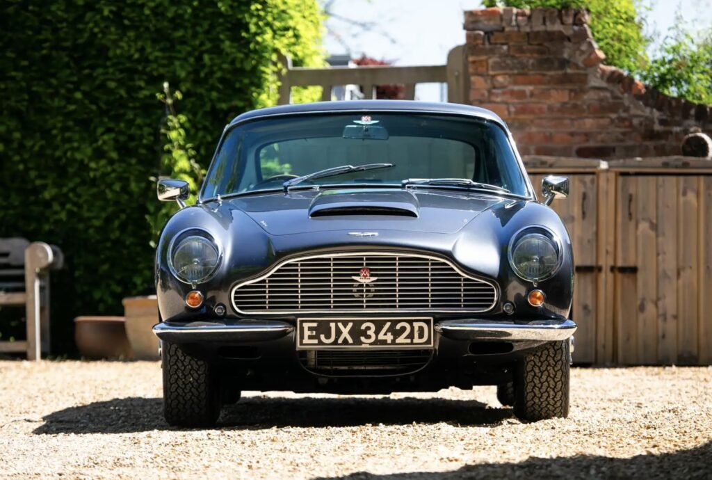 A rare 1966 Aston Martin DB6 Mk1 Vantage with a prized manual gearbox and fewer than 5,000 miles since 1991 has sold at Silverstone auction for £216,000.