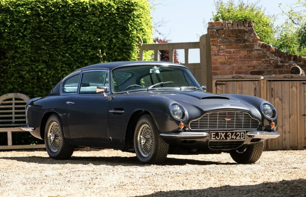 A rare 1966 Aston Martin DB6 Mk1 Vantage with a prized manual gearbox and fewer than 5,000 miles since 1991 has sold at Silverstone auction for £216,000.