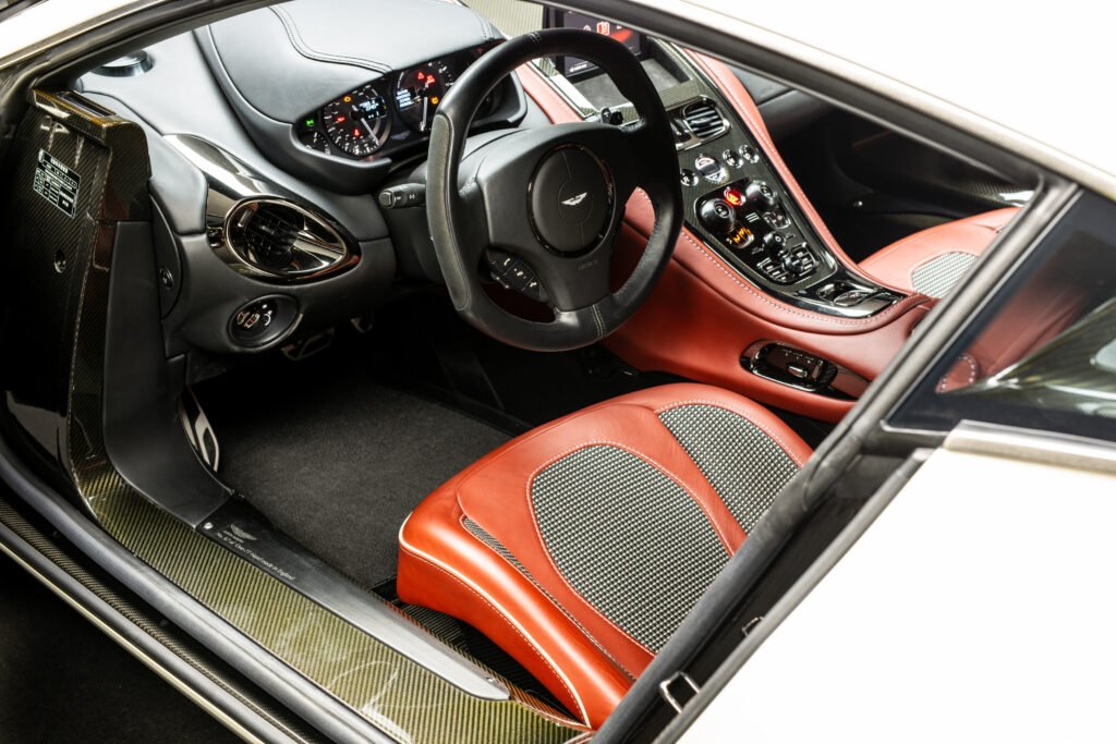 Ultra rare Aston Martin One-77 with 7.3 litre V12 and 217mph top speed heads to RM Sotheby’s Abu Dhabi auction with just 2,744 miles and £1.18m estimate.