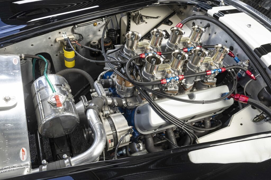 Rare 1966 AC Shelby Cobra ‘13 COB’ with over 100 races, 12 wins and Le Mans history heads to Goodwood Revival auction, expected to fetch up to £2 million.