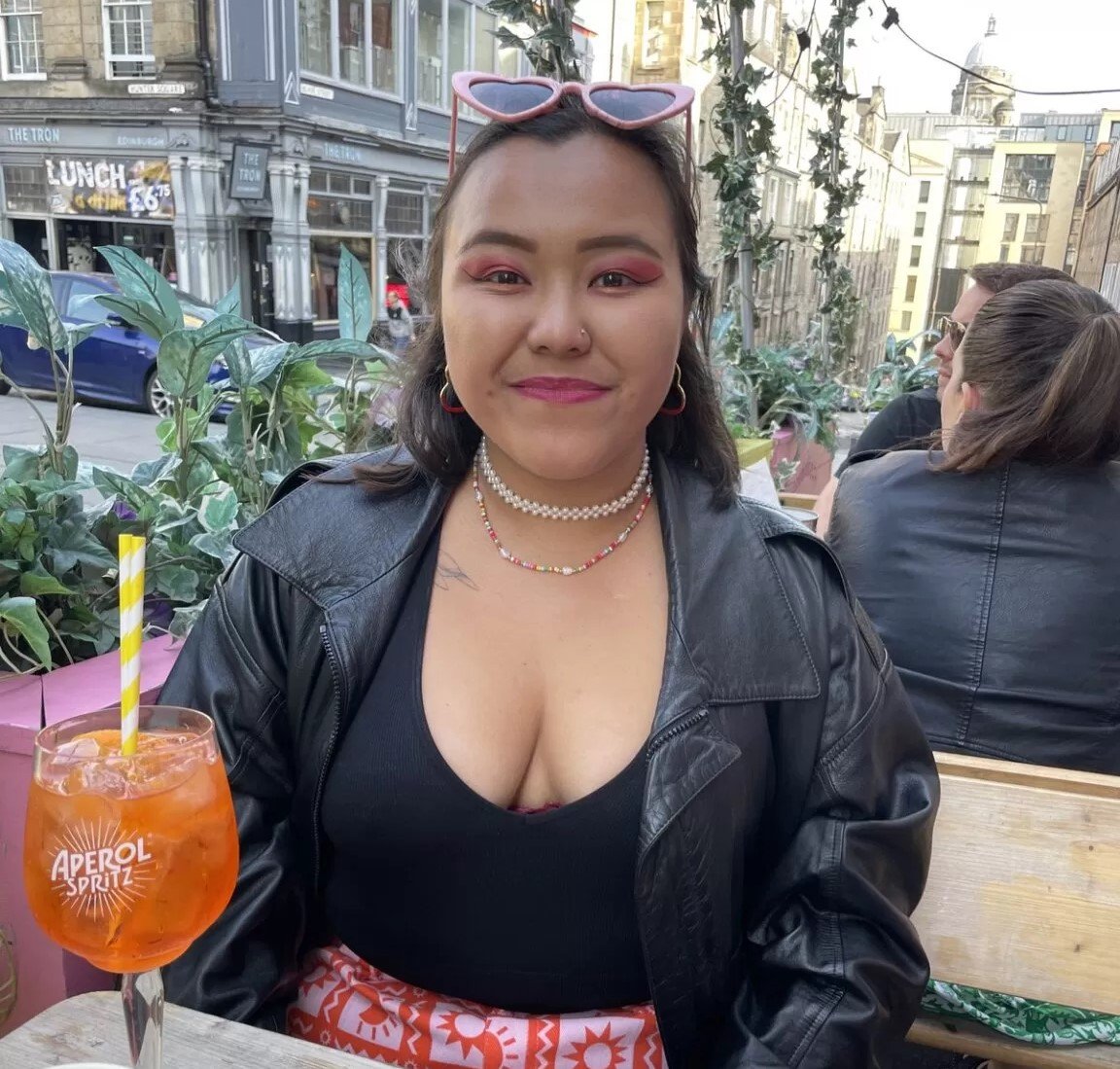 Michele Theil, 25, works 70 hours a week across three jobs to afford £1,225 rent and live alone, saying the freedom and independence are worth every sacrifice.