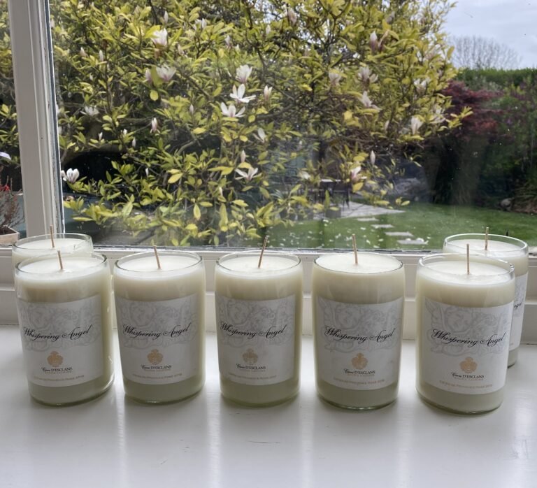 Woman turns leftover bottles into luxury candles building a kitchen table side hustle that grows to £5,000 a month and £8,000 at Christmas transforming her life and career.
