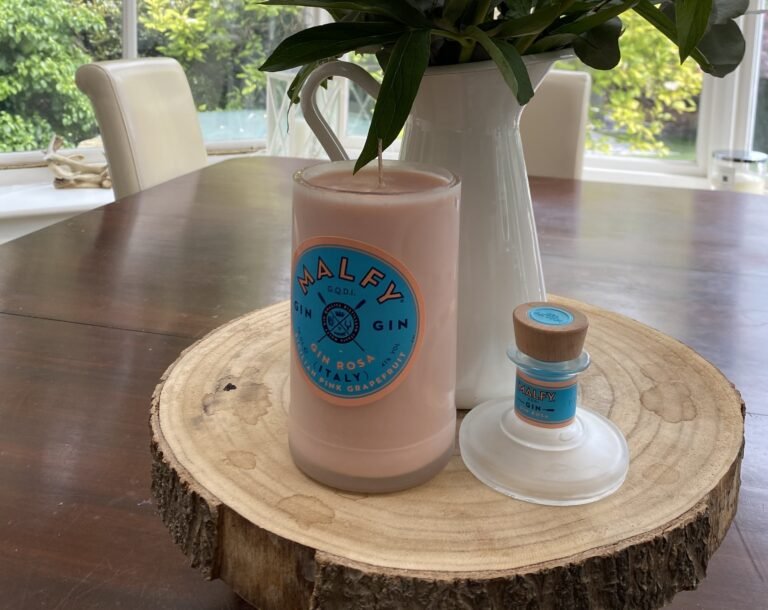 Woman turns leftover bottles into luxury candles building a kitchen table side hustle that grows to £5,000 a month and £8,000 at Christmas transforming her life and career.
